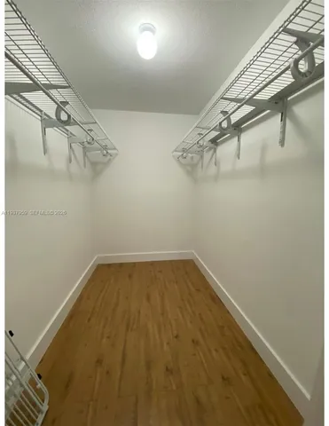 a view of a room with racks on the wall