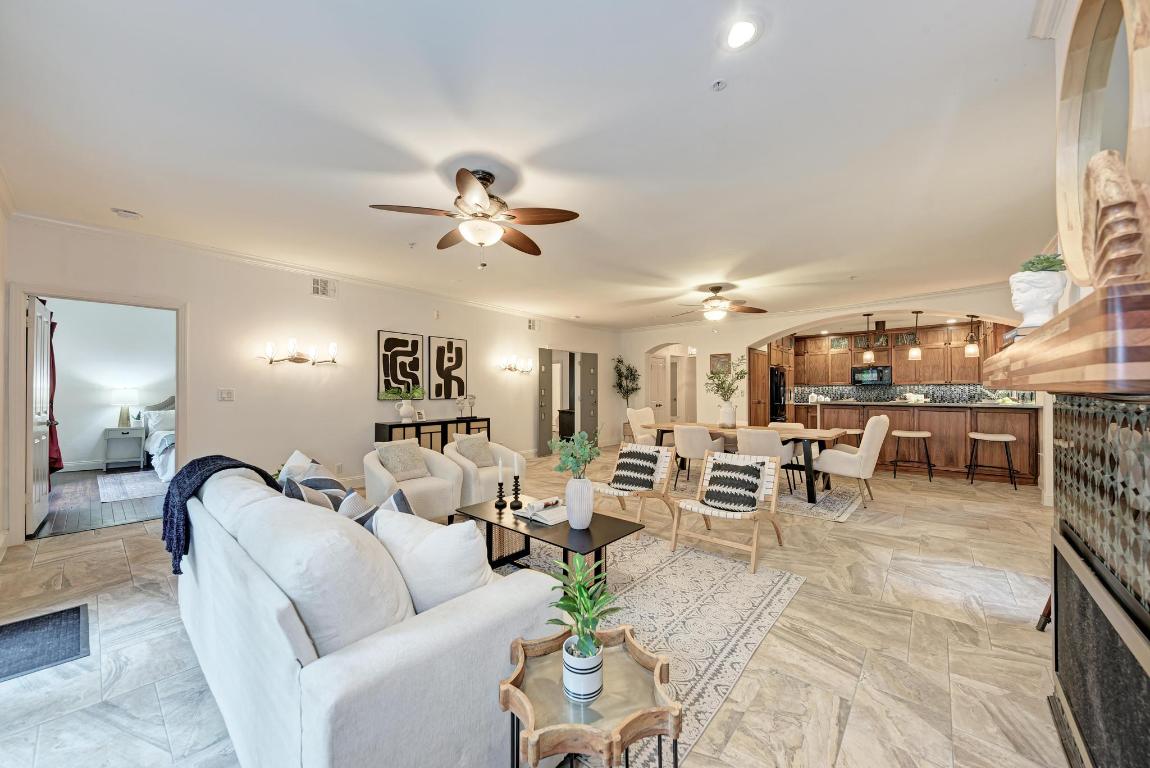 1115 West 7th Street, Unit 106 Austin, TX 78703 - Photo 37 of 40 a living room with furniture and view of kitchen