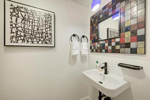 a bedroom with furniture and window