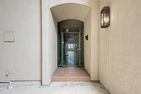 a view of a chairs and table in backyard