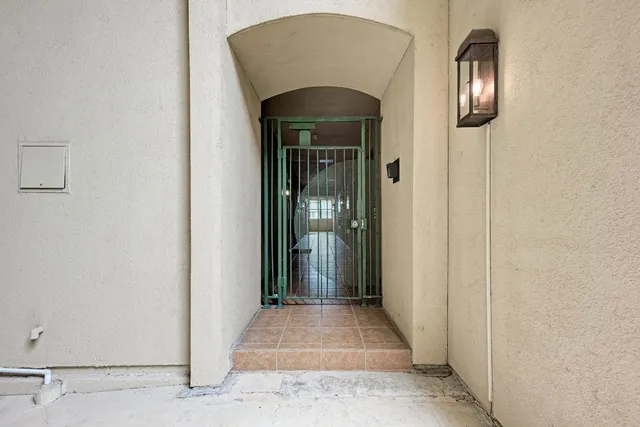 a view of a chairs and table in backyard