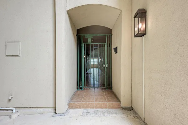 a view of a chairs and table in backyard