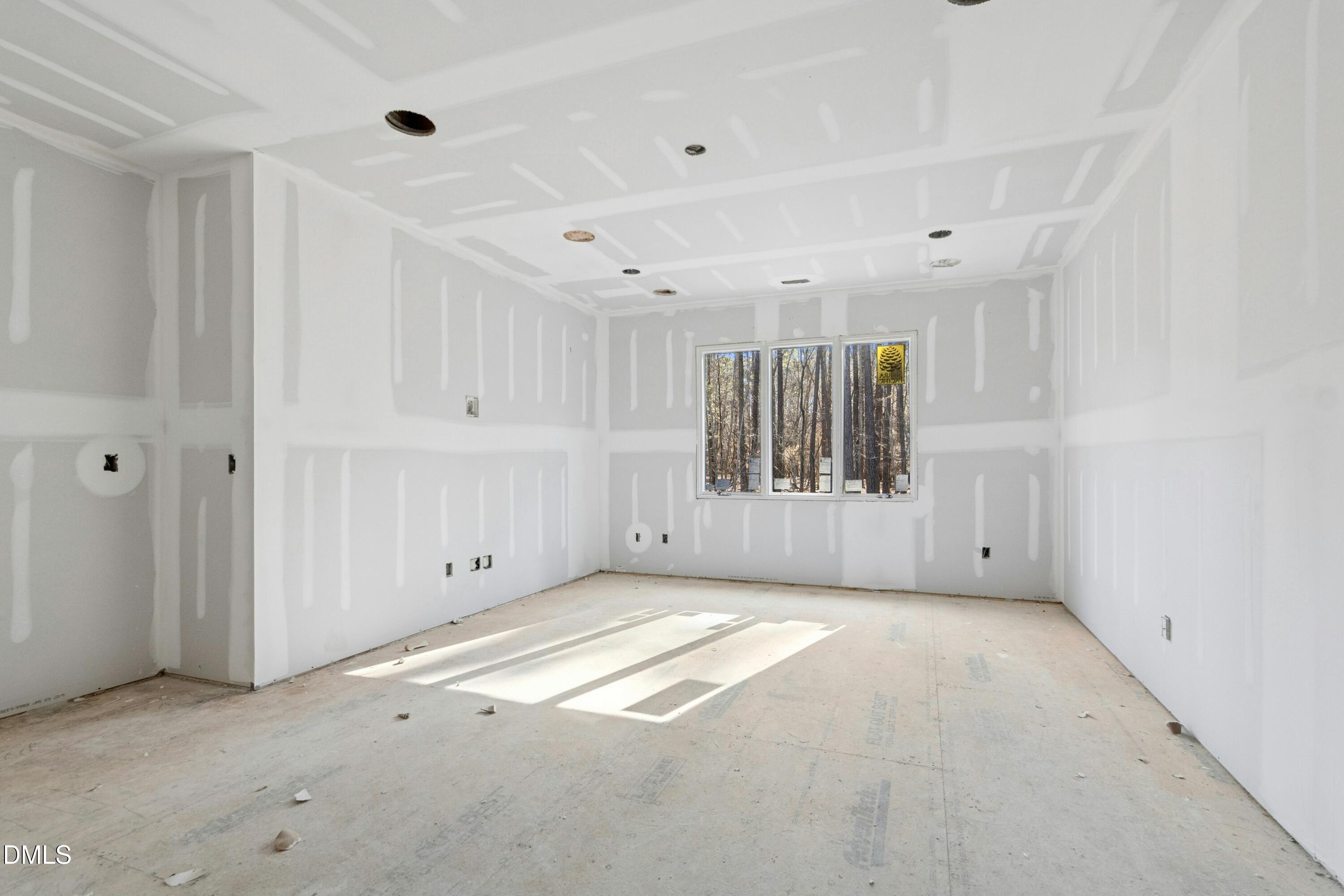 2008 Cadenza Lane Raleigh, NC 27614 - Photo 15 of 46 a view of an empty room with a window