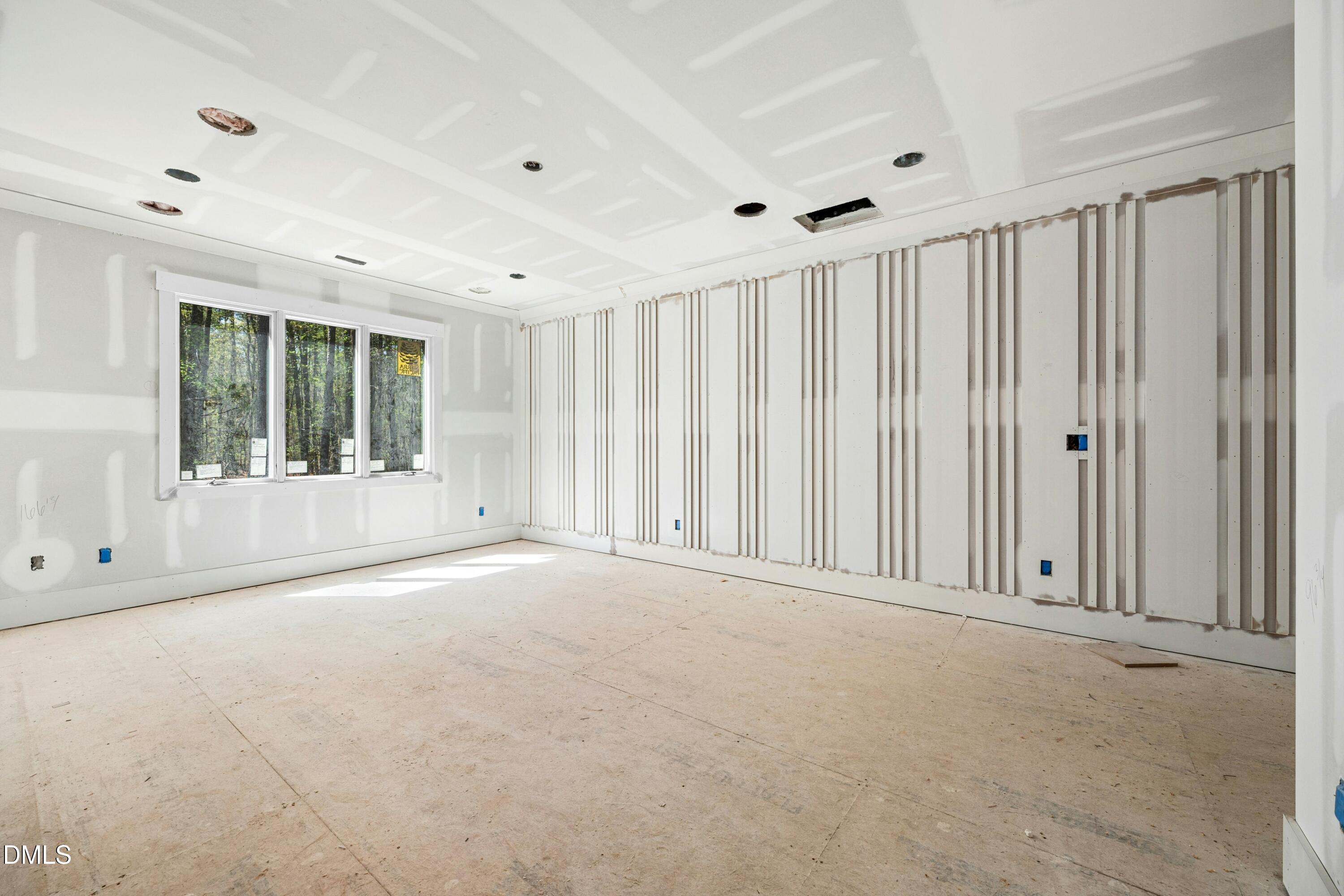 2008 Cadenza Lane Raleigh, NC 27614 - Photo 35 of 46 a view of an empty room with a window