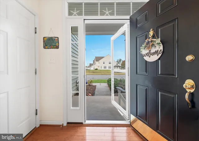 a view of a hallway with dining area