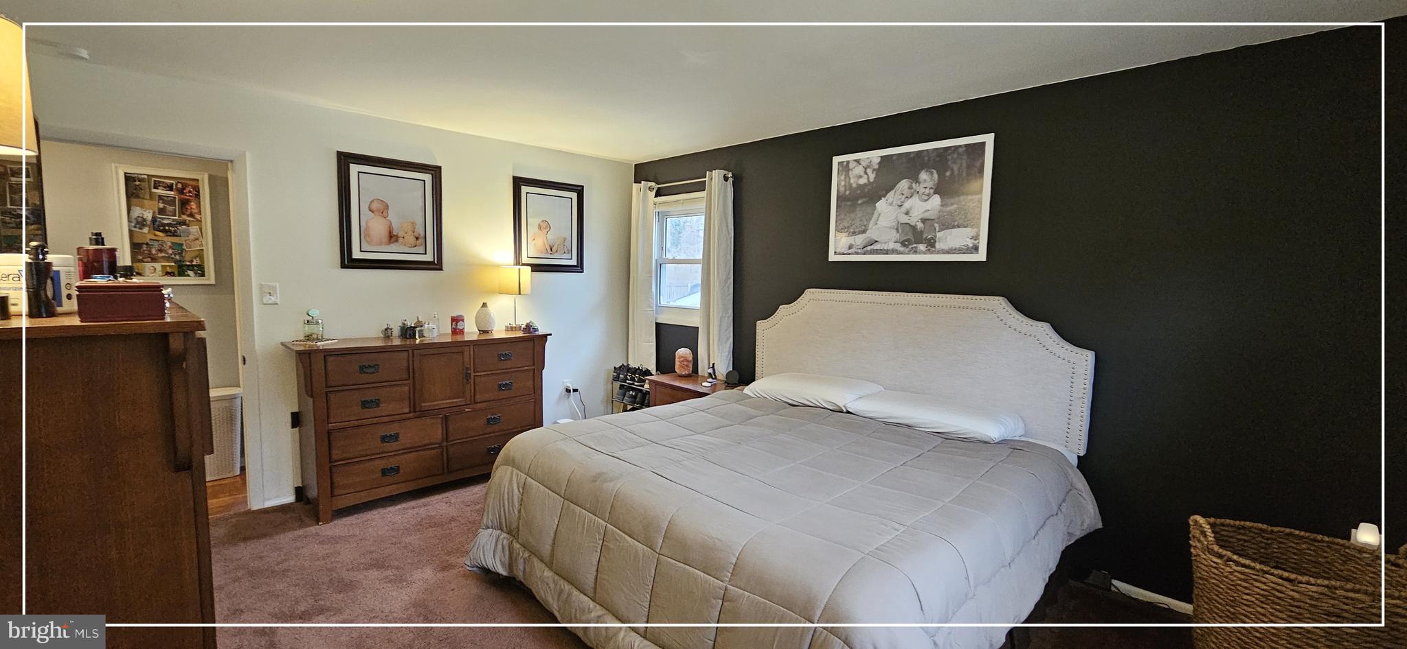 1109 Grinnell Road Wilmington, DE 19803 - Photo 16 of 29 a bedroom with a bed and a cabinets