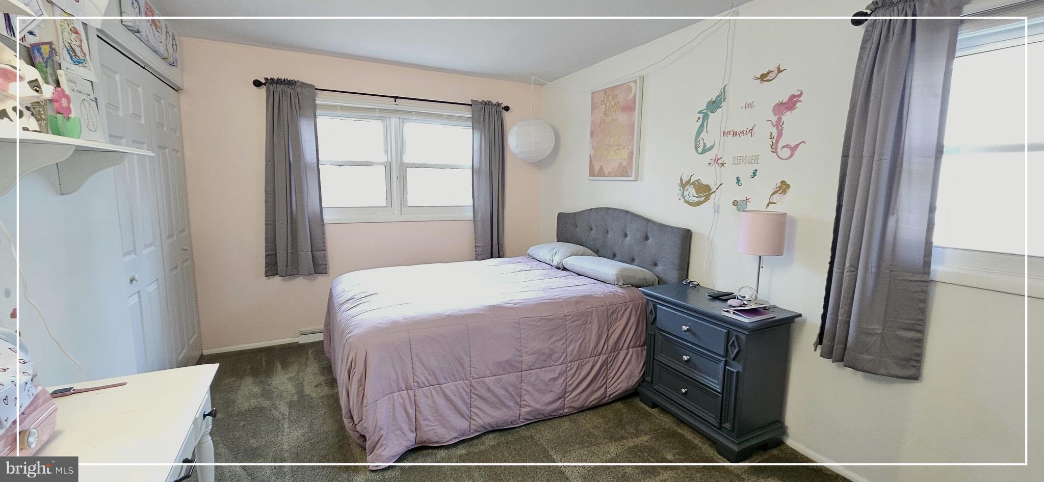 1109 Grinnell Road Wilmington, DE 19803 - Photo 21 of 29 a bedroom with a bed and a window
