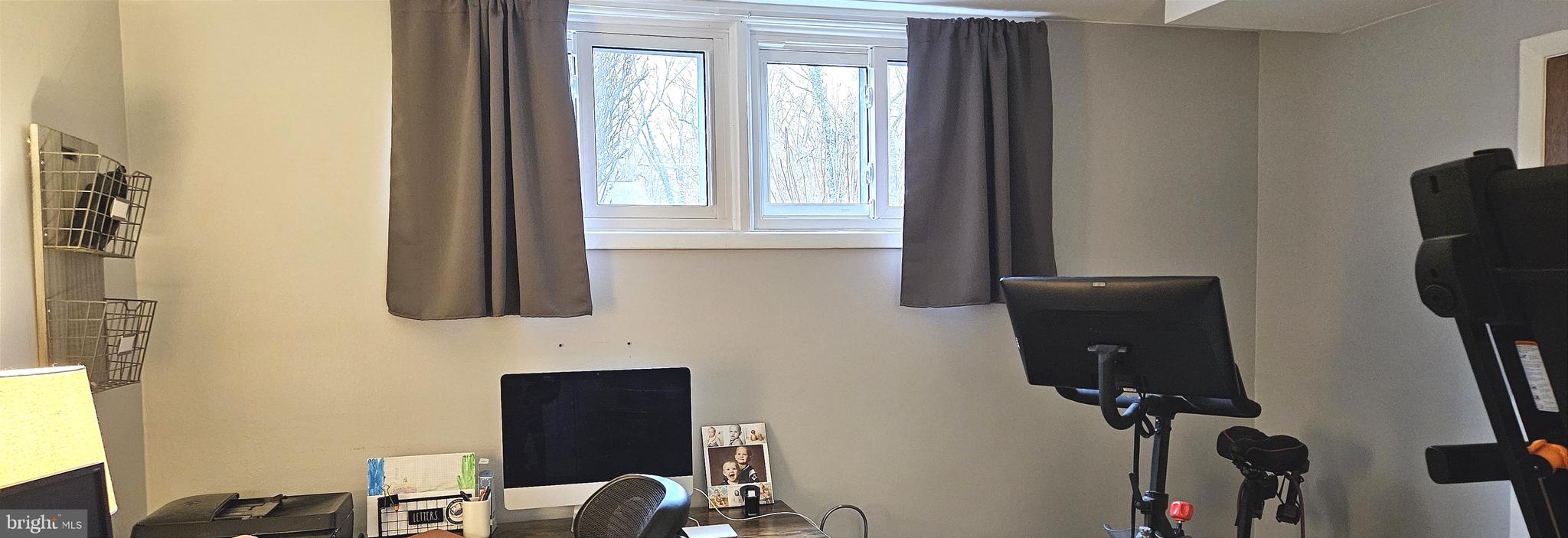 1109 Grinnell Road Wilmington, DE 19803 - Photo 26 of 29 a bathroom with a window and a mirror