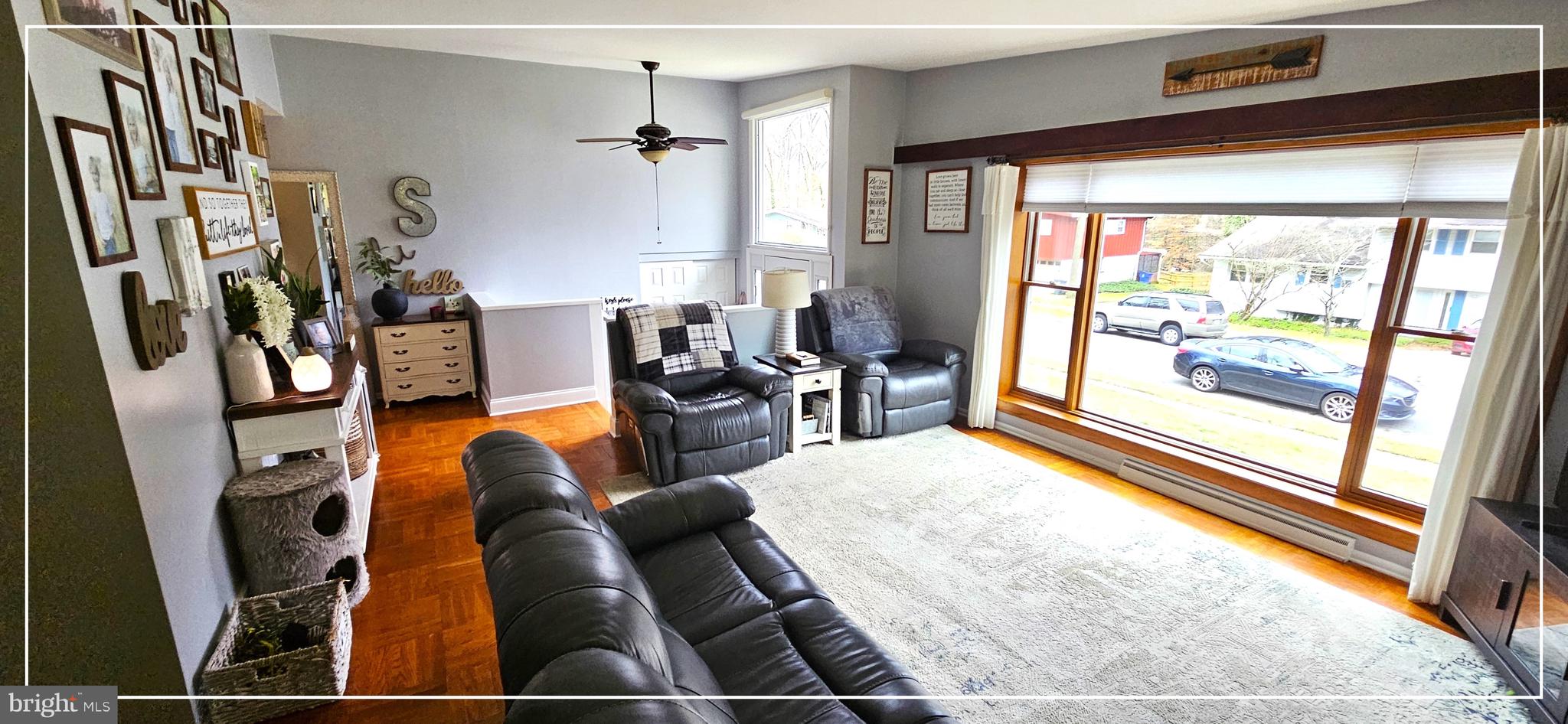 1109 Grinnell Road Wilmington, DE 19803 - Photo 3 of 29 a living room with furniture and a floor to ceiling window