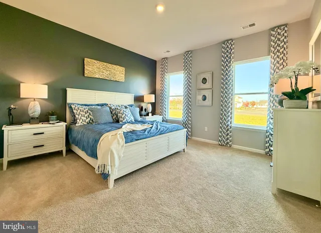 a bed room with a bed and a couch