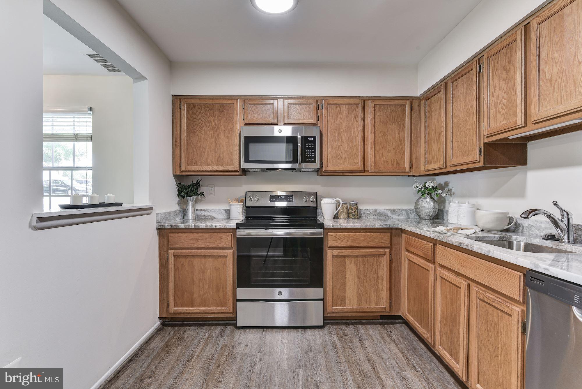 13007 Conductor Way, Unit 4 Silver Spring, MD 20904 - Photo 16 of 42 Newly Refinished Cabinets!