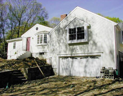 246 Morehouse Road Easton, CT 06612 - Photo 1 of 1 a front view of a house with a yard