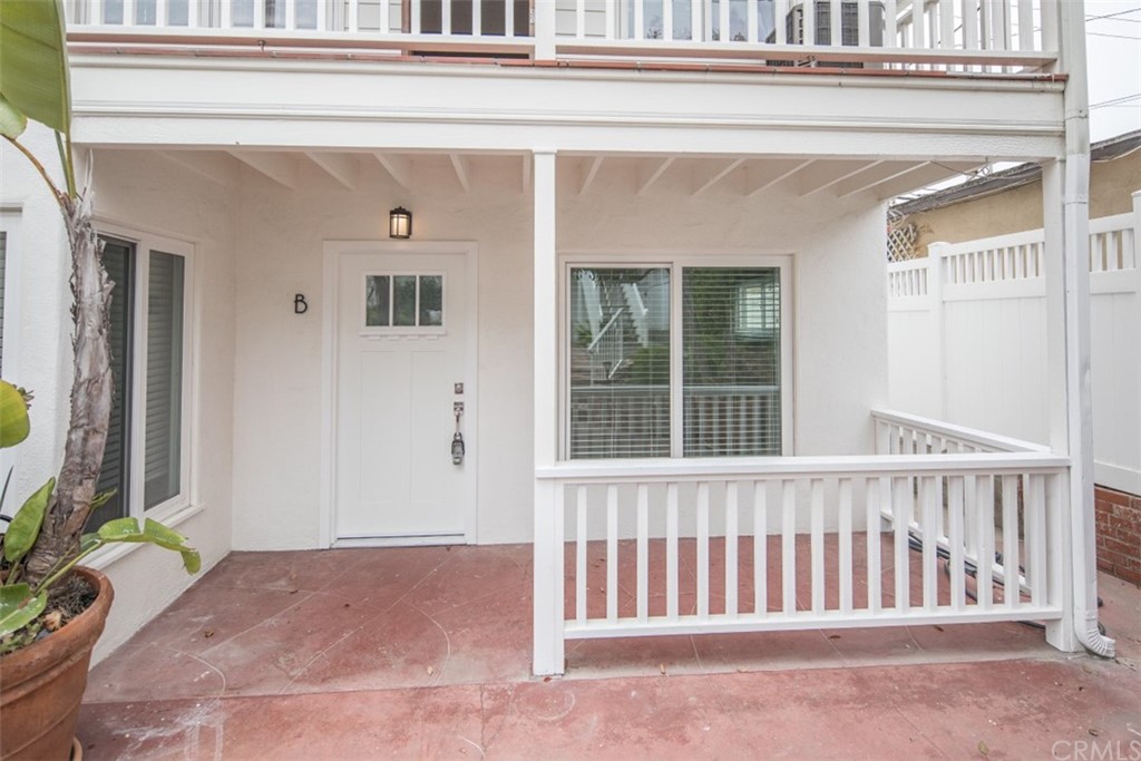319 Cypress Drive, Unit B Laguna Beach, CA 92651 - Photo 2 of 39 a view of a porch with a bench
