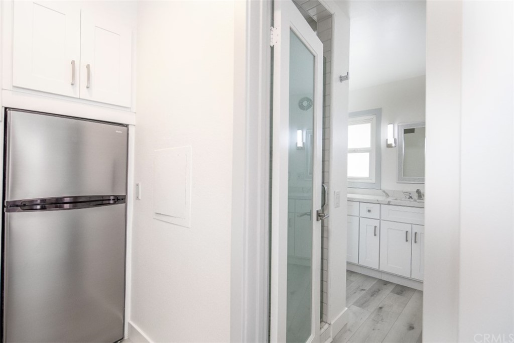 319 Cypress Drive, Unit B Laguna Beach, CA 92651 - Photo 12 of 39 a view of bathroom with a shower and a mirror