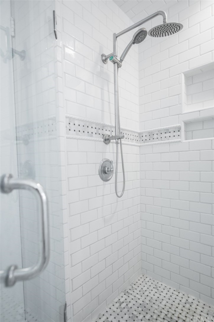 319 Cypress Drive, Unit B Laguna Beach, CA 92651 - Photo 18 of 39 a bathroom with a shower