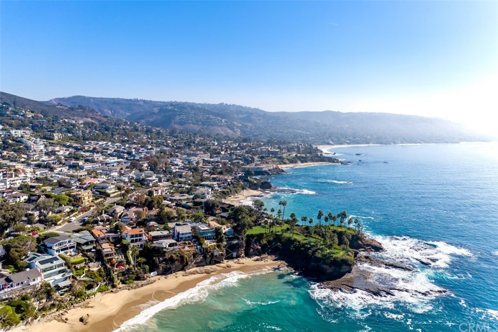 319 Cypress Drive, Unit B Laguna Beach, CA 92651 - Photo 33 of 39 a view of a lake with a mountain in the back