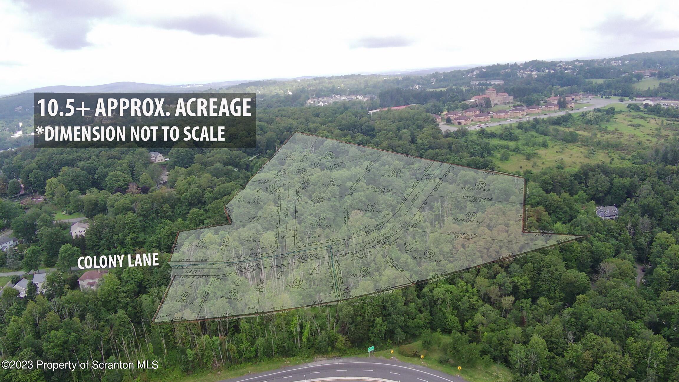 Colony Lane Clarks Summit, PA 18411 - Photo 1 of 6 a view of a city with lush green forest