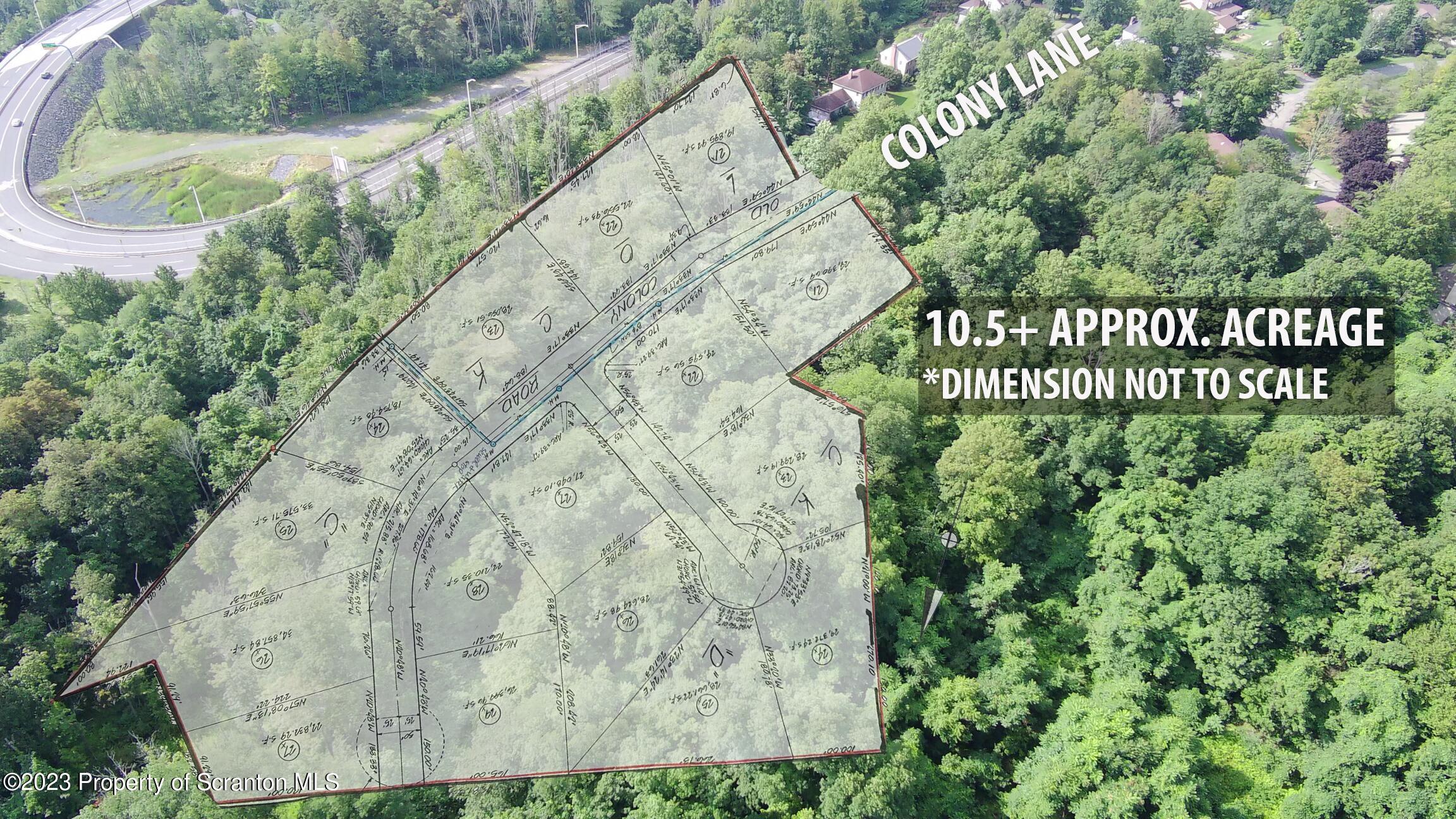 Colony Lane Clarks Summit, PA 18411 - Photo 5 of 6 a sign on the side of the road