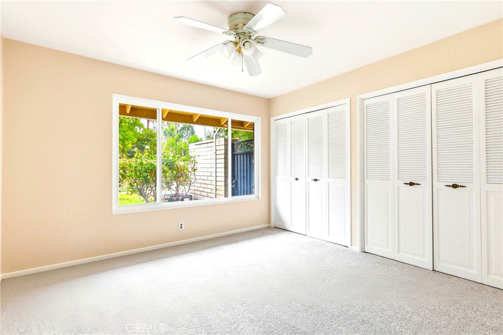 2145 Fairview Avenue Riverside, CA 92506 - Photo 22 of 35 a view of a livingroom with a ceiling fan and window