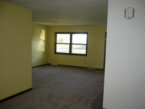 339 Irene Rochelle, IL 61068 - Photo 4 of 5 a view of an empty room with a window