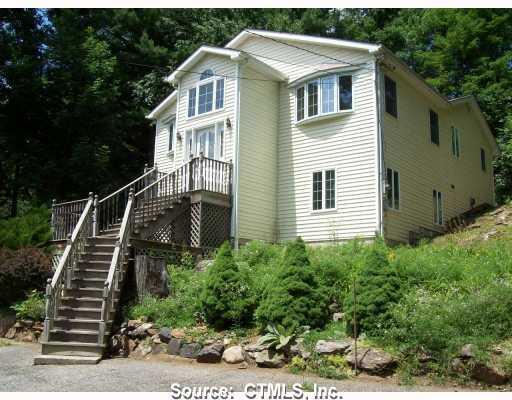 1 Shad Blow Road New Fairfield, CT 06812 - Photo 1 of 1 a front view of a house with stairs