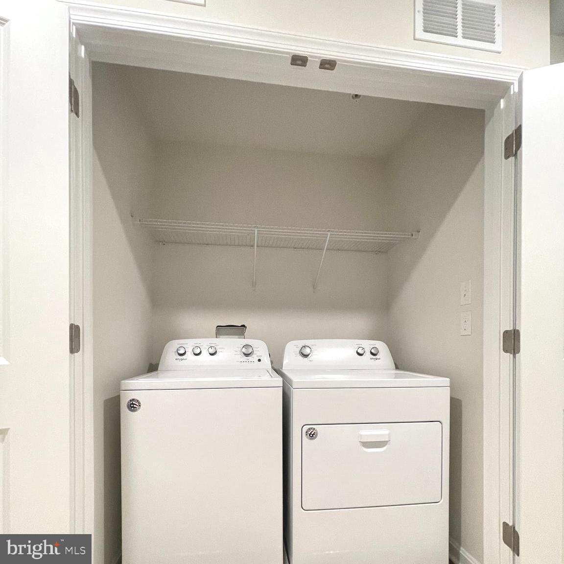 2709 Princess Victoria Way Bowie, MD 20721 - Photo 20 of 31 a utility room with dryer and washer