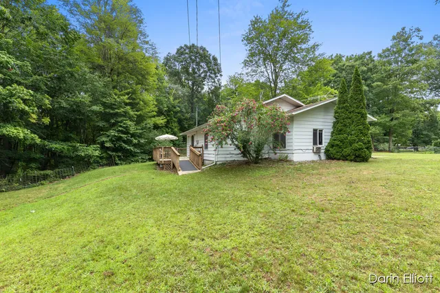 $165,900 | 901 Half Moon Lake Drive Southwest, Stanton, MI 48888