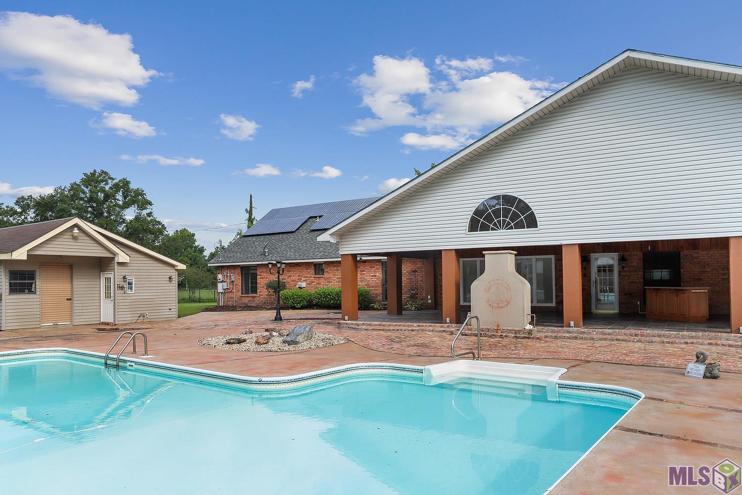 12051 Griffith Road Gonzales, LA 70737 - Photo 2 of 30 Salt water pool