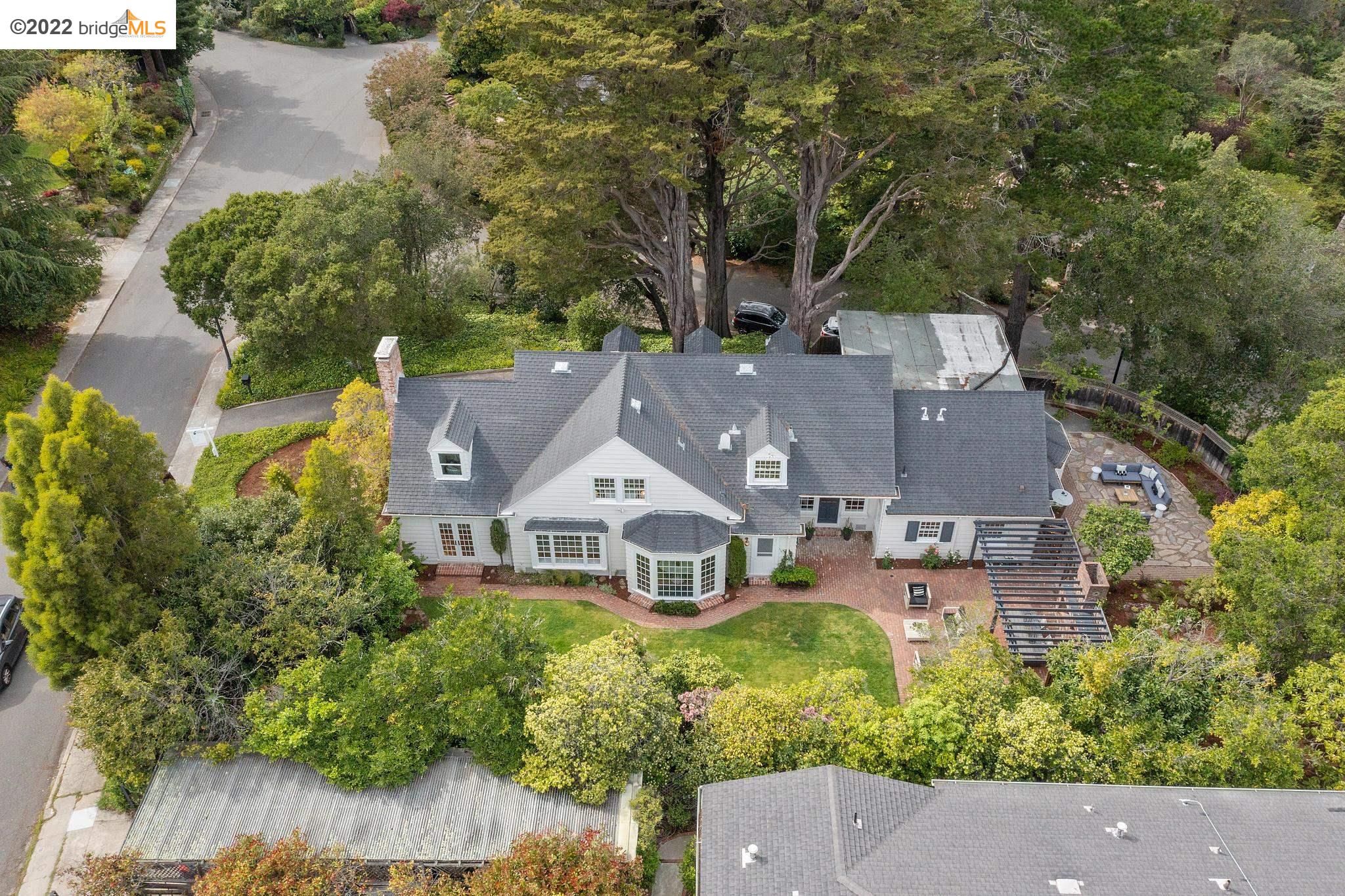 an aerial view of a house with a garden