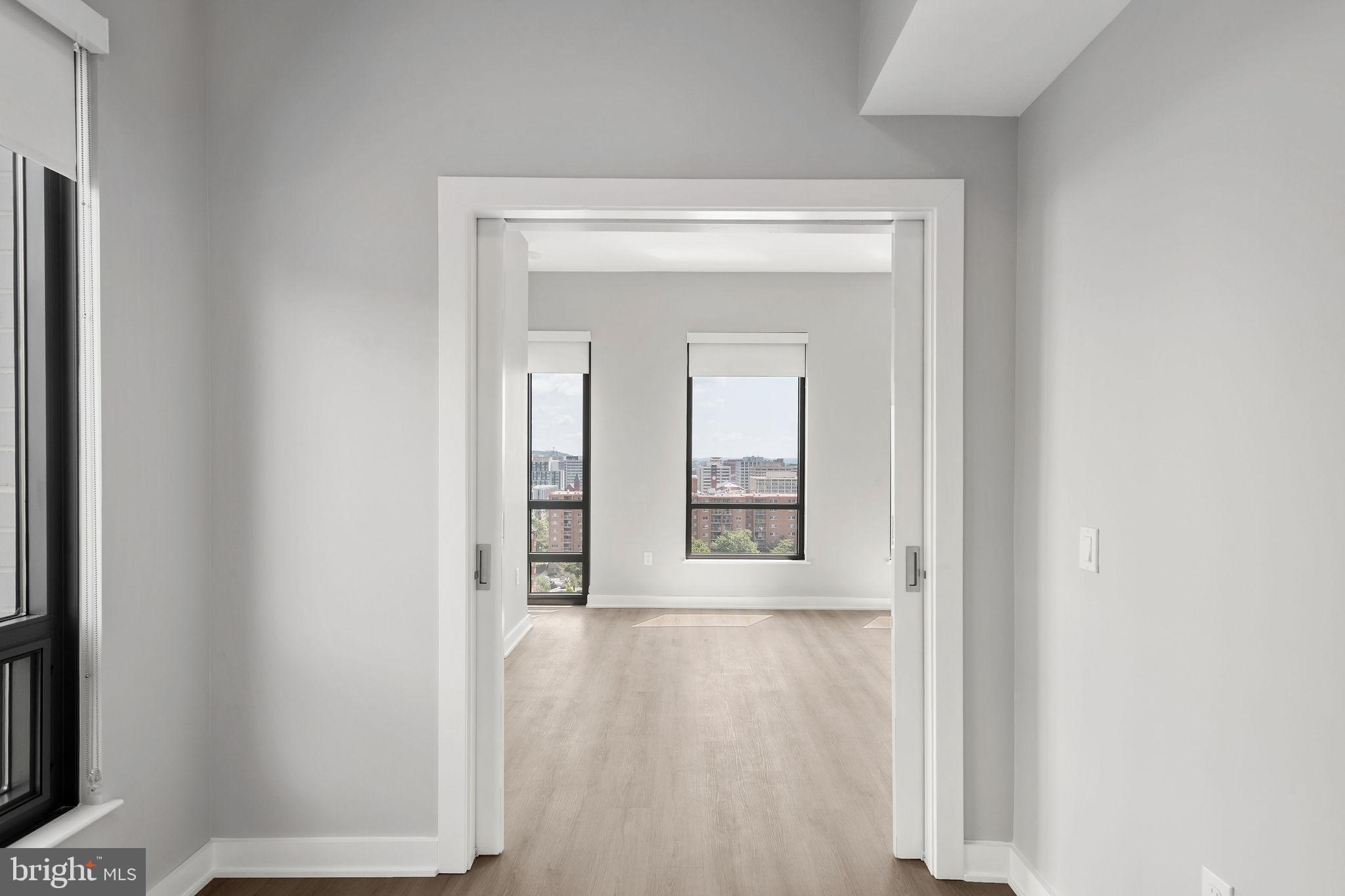 950 3rd Street Northwest, Unit PH1202 Washington, DC 20001 - Photo 32 of 45 a view of an empty room with a window