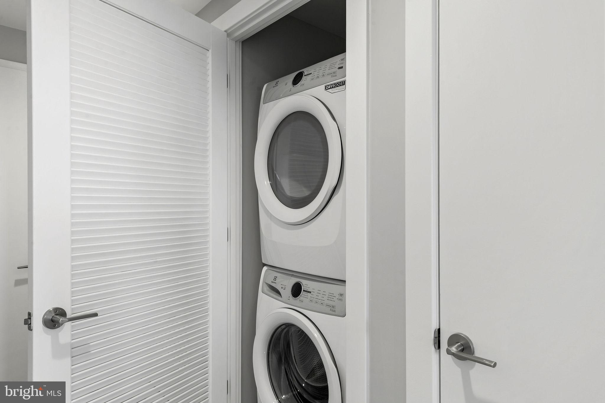 950 3rd Street Northwest, Unit PH1202 Washington, DC 20001 - Photo 42 of 45 a utility room with dryer and washer