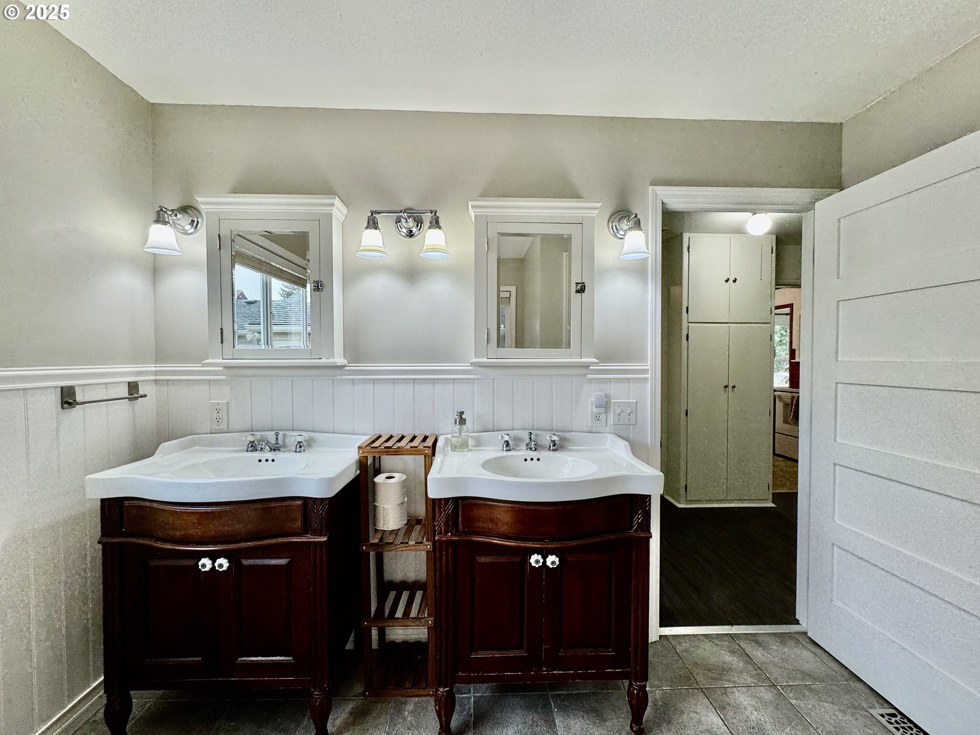 34603 Church Road Warren, OR 97053 - Photo 30 of 42 a bathroom with a sink and a mirror