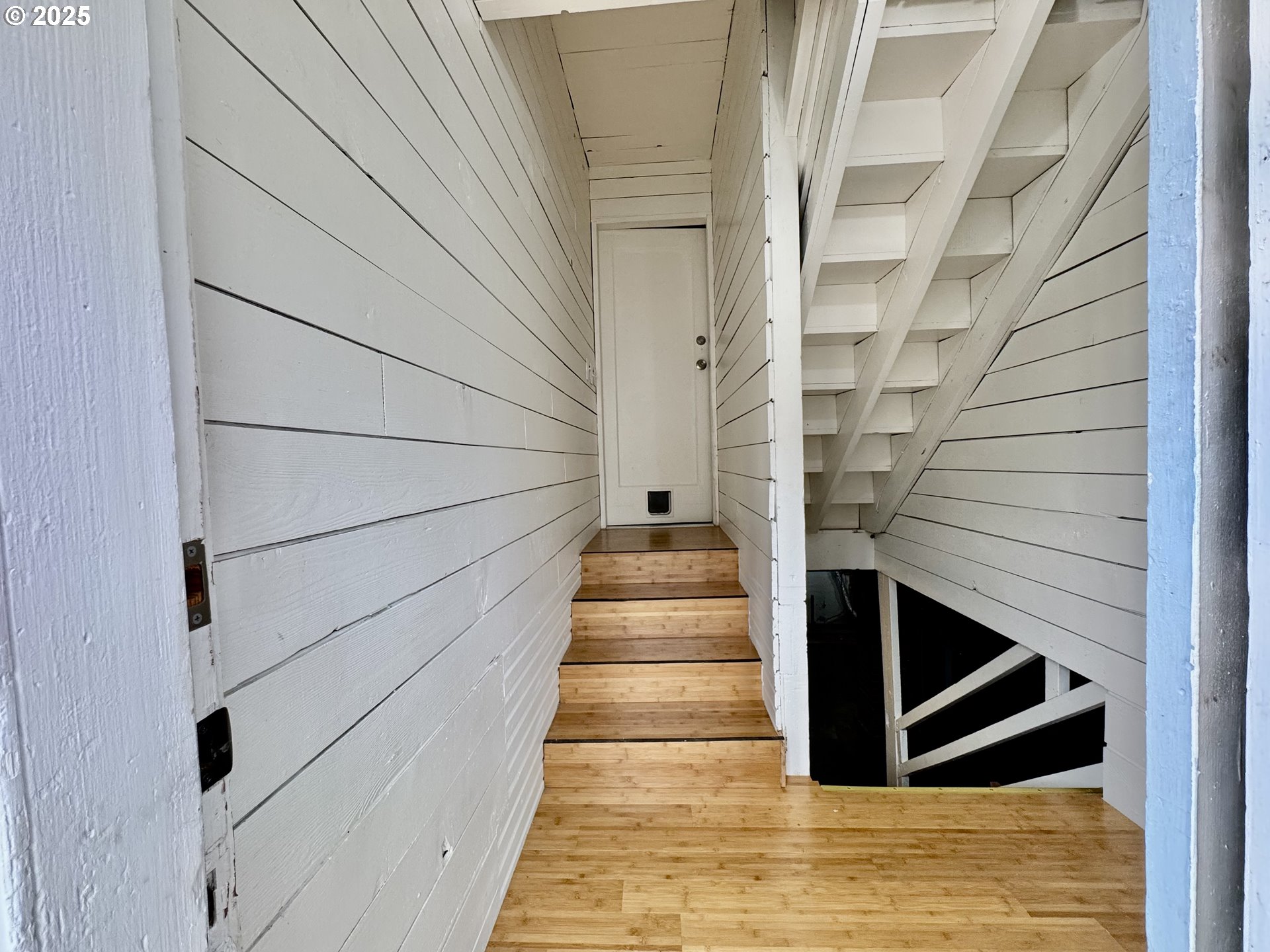 34603 Church Road Warren, OR 97053 - Photo 34 of 42 a view of entryway with wooden floor