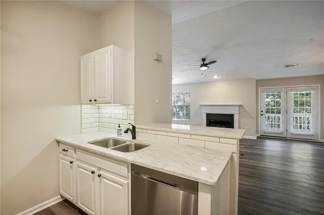 a kitchen with a stove and a microwave