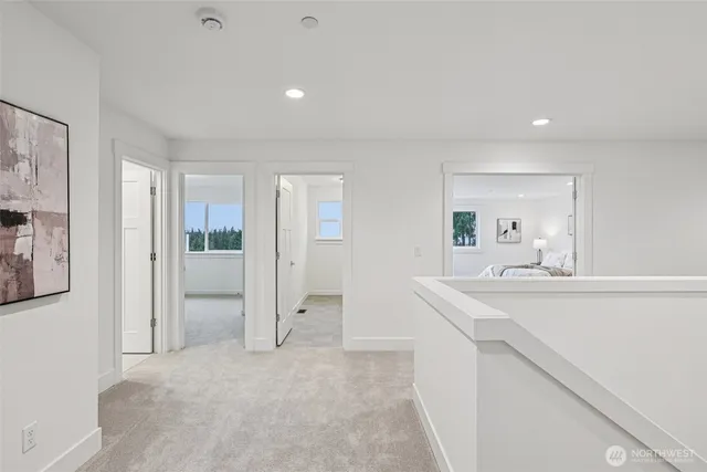 a view of a bathroom with a sink and mirror