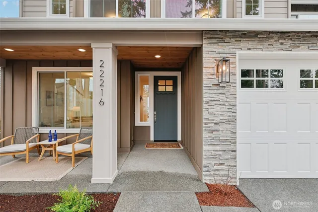 a front view of a building with outdoor seating