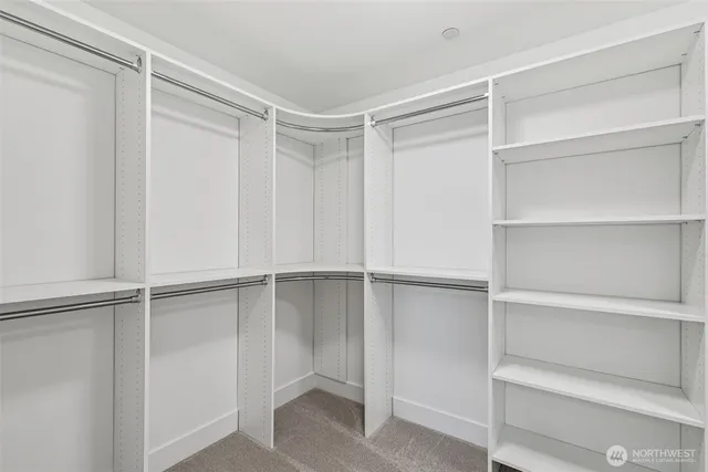 a view of an empty walk in closet