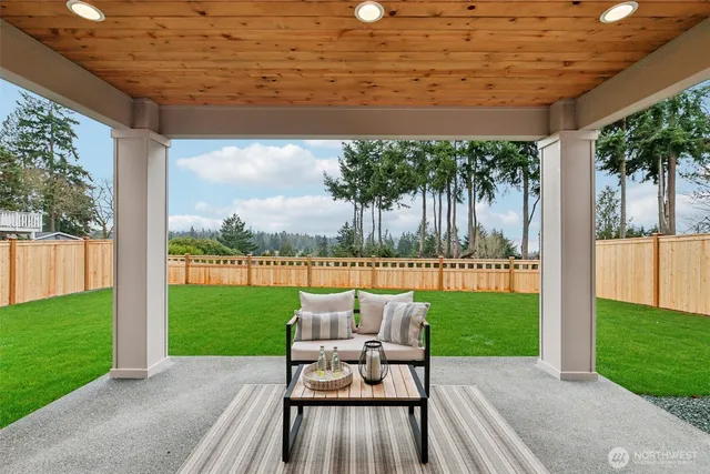 a view of a patio with garden