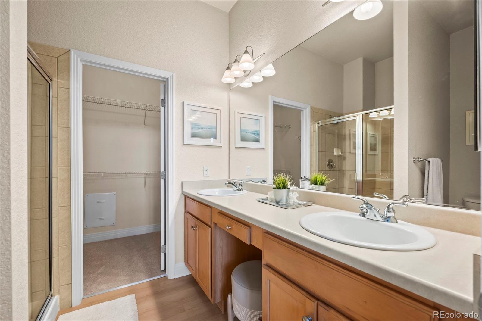 209 Quebec Street, Unit L Denver, CO 80220 - Photo 24 of 46 a bathroom with a sink double vanity and a mirror