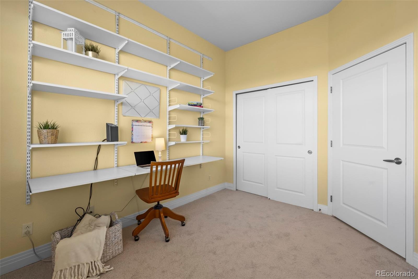 209 Quebec Street, Unit L Denver, CO 80220 - Photo 29 of 46 a view of an empty room