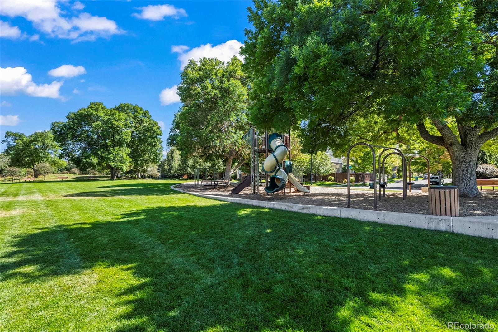 209 Quebec Street, Unit L Denver, CO 80220 - Photo 35 of 46 a view of a park with a tree