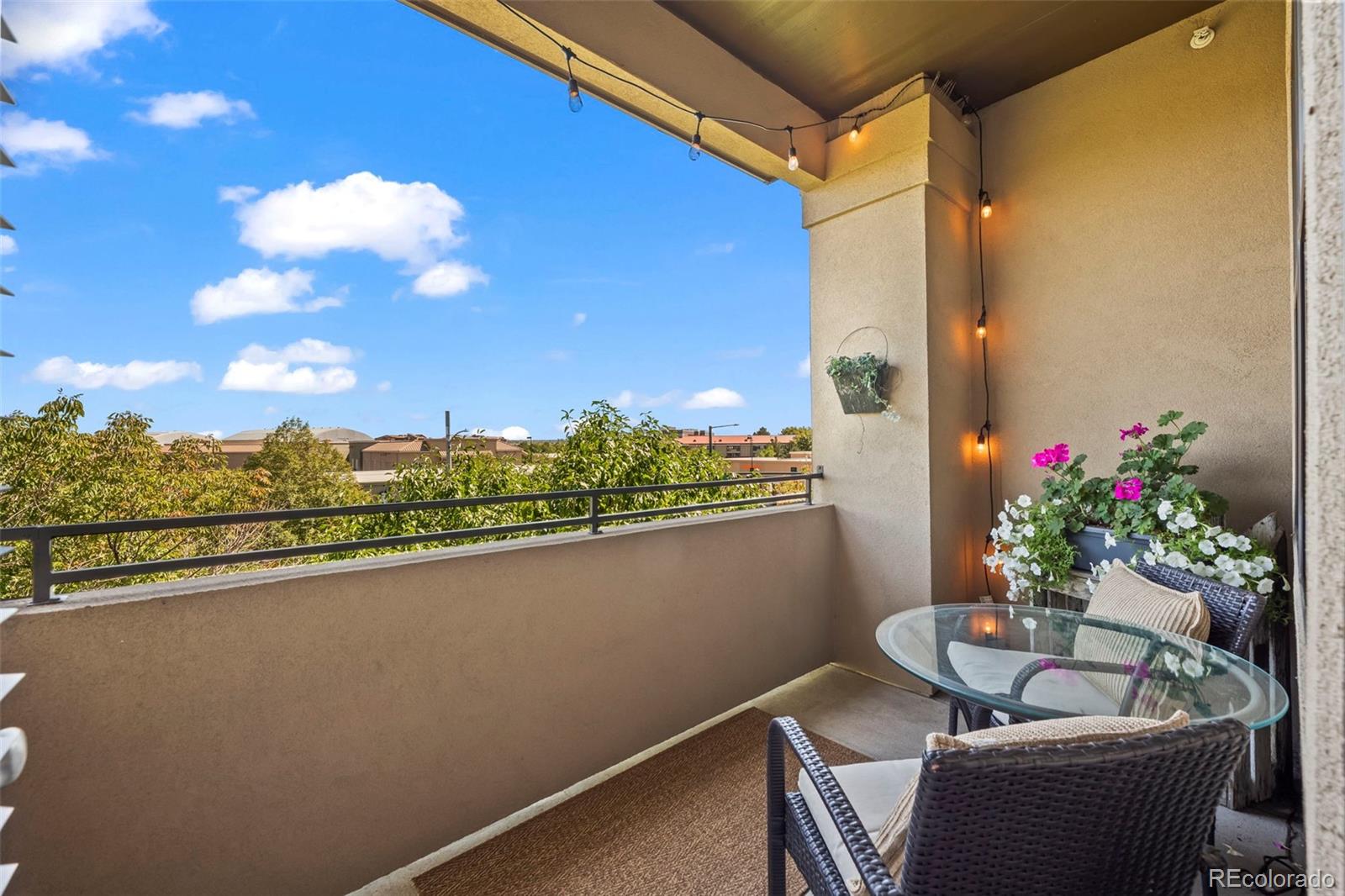 209 Quebec Street, Unit L Denver, CO 80220 - Photo 9 of 46 a view of balcony with a potted plant