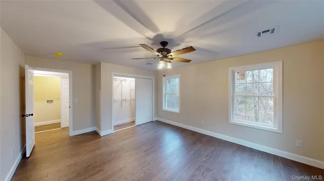 a view of a bathroom from a hallway