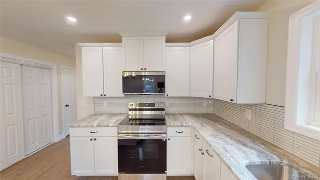 a large kitchen with a lot of counter space