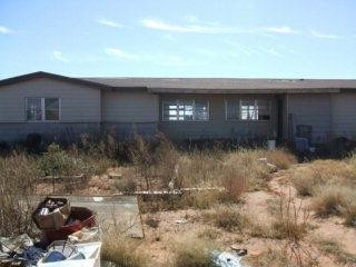 6400 Foster Road Ropesville, TX 79358 - Photo 1 of 1 a front view of a house with garden