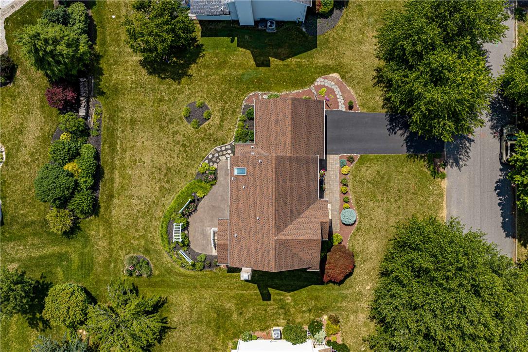 4568 Greenfield Road Bethlehem, PA 18017 - Photo 50 of 59 An aerial perspective showcases a well-maintained property with mature trees and a neatly paved driveway.