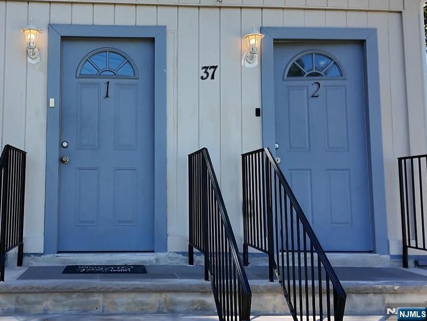 37 Riverside Avenue Little Ferry, NJ 07643 - Photo 33 of 34 an entryway door with wooden floor