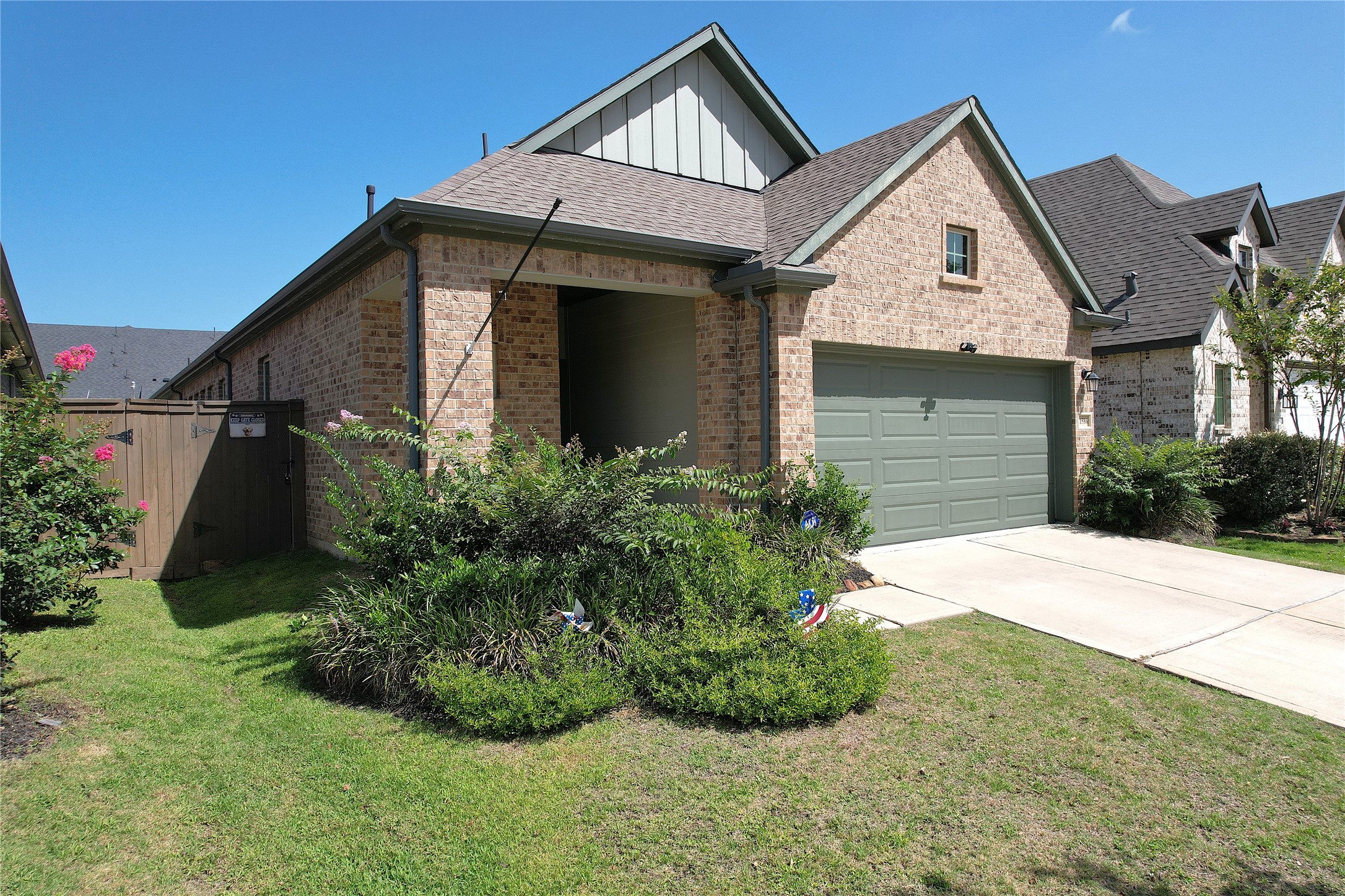 21586 Jordan Pond Ridge Porter, TX 77365 - Photo 3 of 30 Side view of of this pretty home at 21586 Jordan Pond Ridge