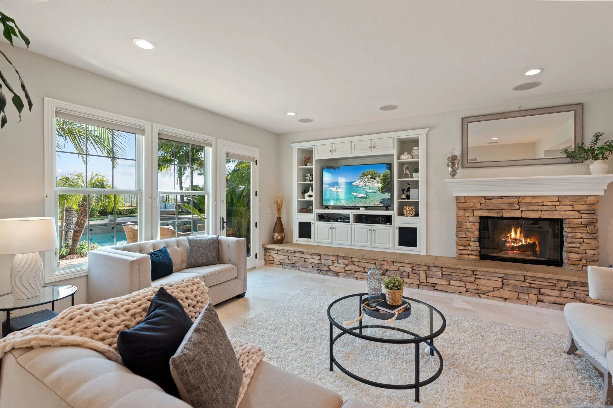 15583 Rising River Place South San Diego, CA 92127 - Photo 23 of 61 a living room with furniture fireplace and window