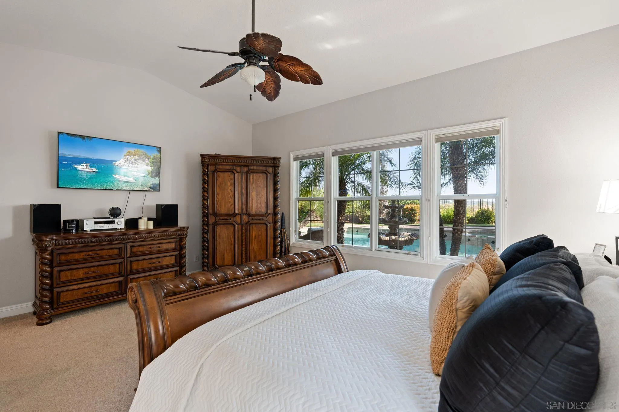 15583 Rising River Place South San Diego, CA 92127 - Photo 28 of 61 a bed room with a bed and a television